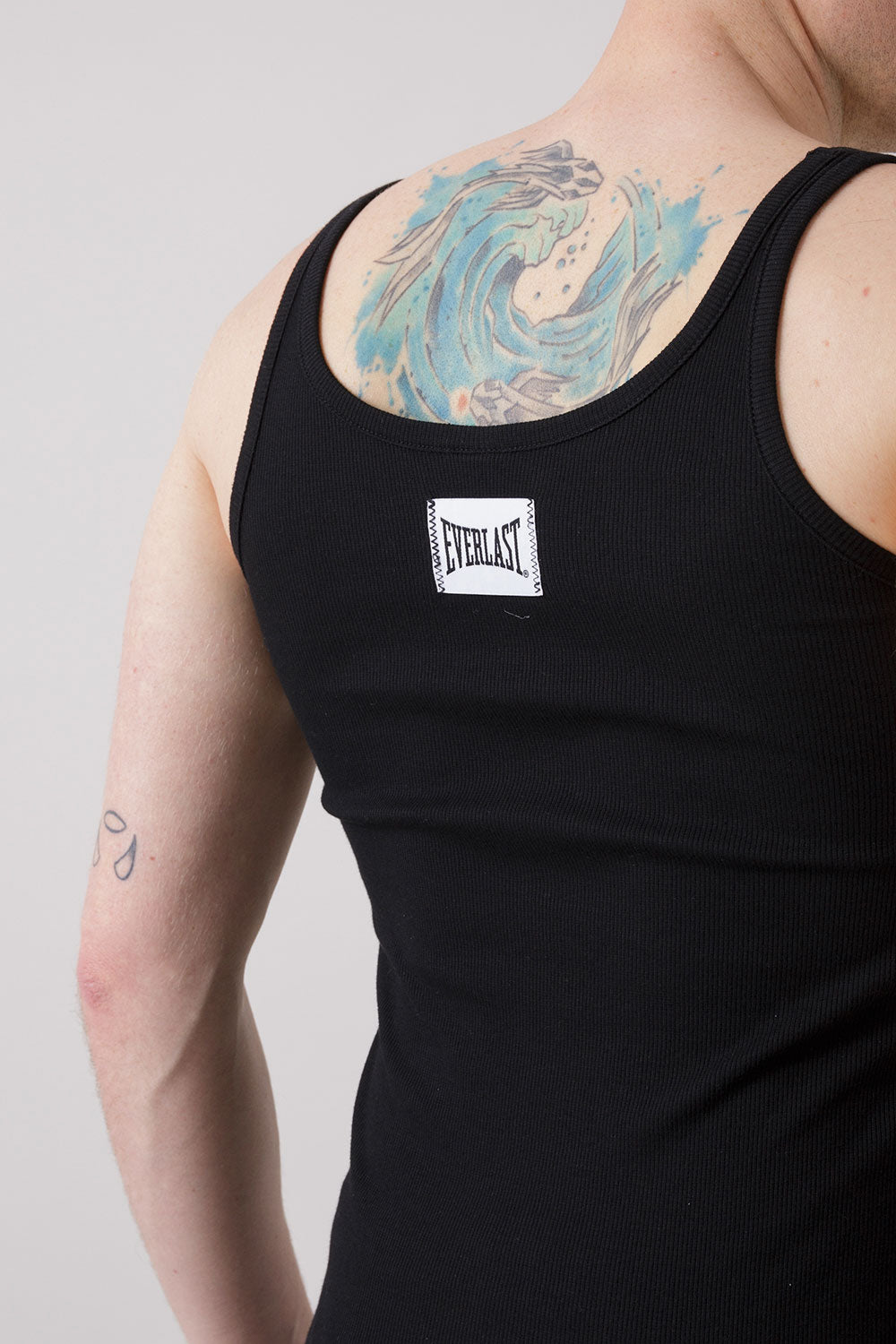 THE ICON RIBBED TANK TOP