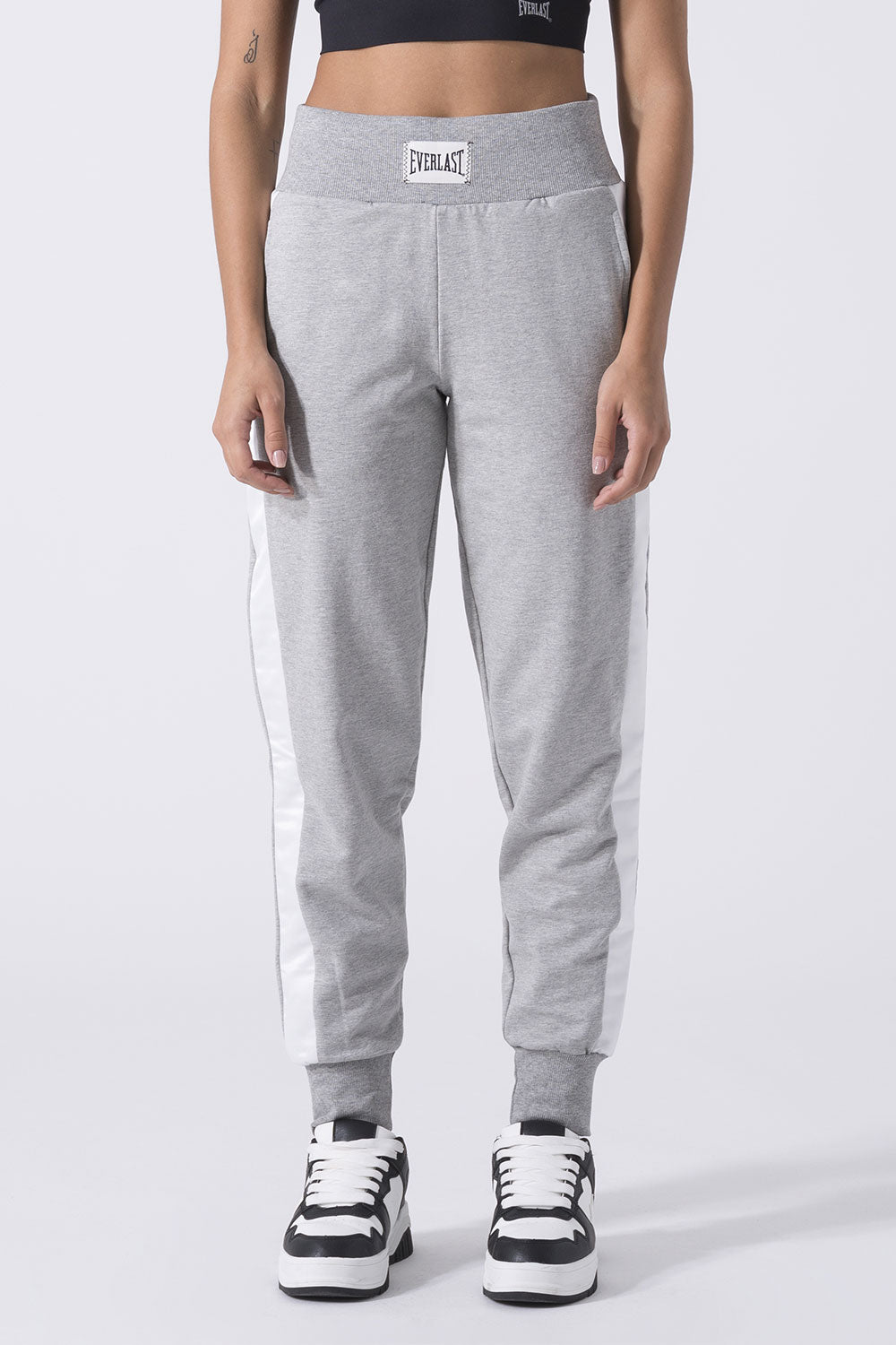 EXCLUSIVE TROUSERS WITH SATIN INSERTS